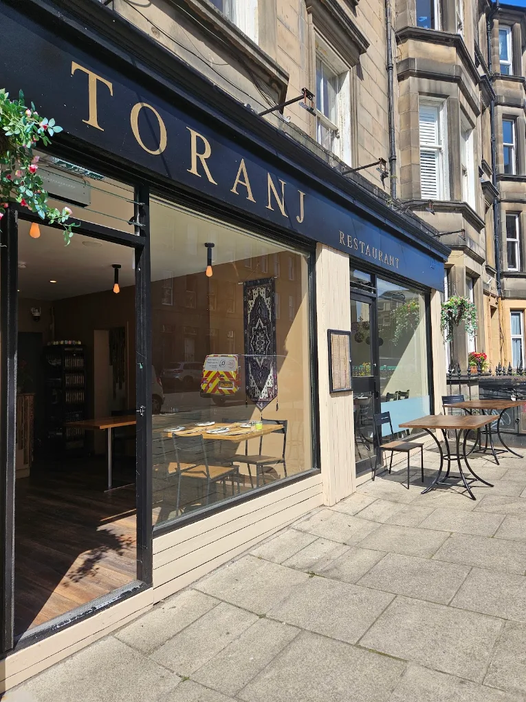 Exterior view of Toranj Persian Restaurant storefront in Edinburgh.